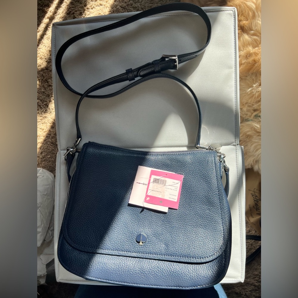 Navy Kate Spade and Michael Kors Wallet. Excellent used condition. Like new.
